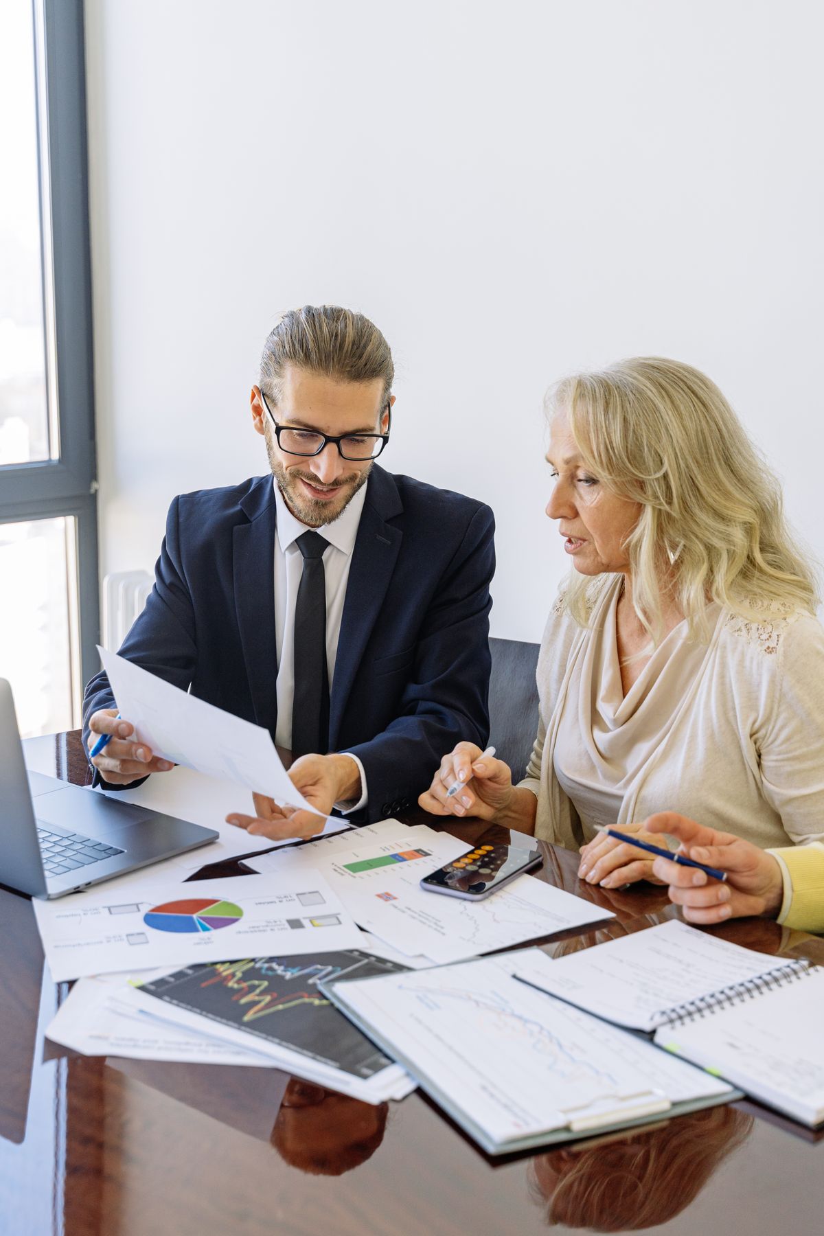 Healthcare executives reviewing financials